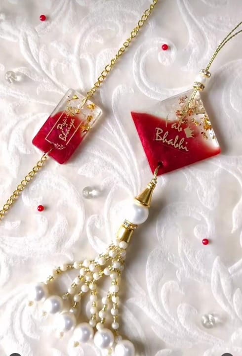 "Customized Resin Lumba Rakhi Set – For Bhaiya and Bhabhi"